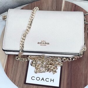 Coach Anna Foldover Pebbled
Leather Crossbody Clutch